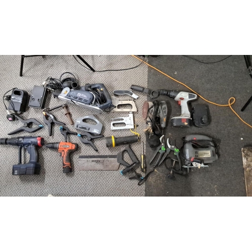 774 - Includes drills, jigsaws, clamps, staple guns, and a belt sander. Brands include Parkside, Black & D... 