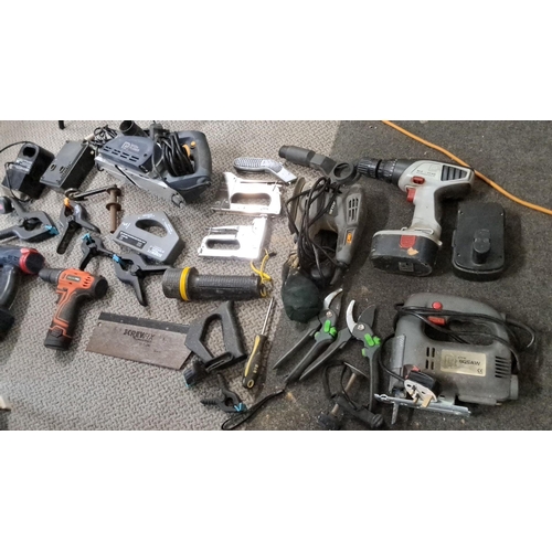 774 - Includes drills, jigsaws, clamps, staple guns, and a belt sander. Brands include Parkside, Black & D... 