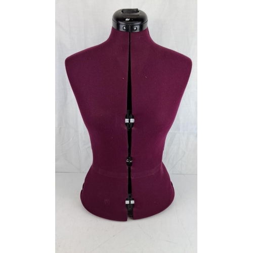 1 - Adjustable dress form in deep burgundy fabric with black plastic neck and base, showcasing a front s... 