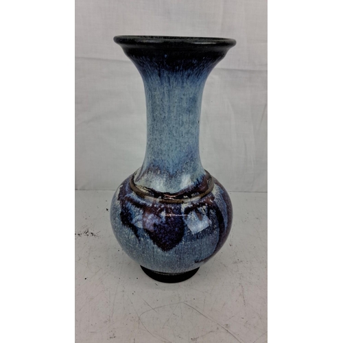 109 - Handmade stoneware vase from Rossmore Pottery, County Cork. Features a blue gradient glaze and a bul... 