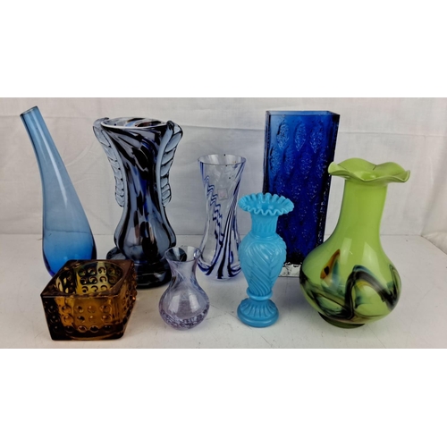 11 - Collection of eight assorted vintage glass vases in various colors and designs, including blue, ambe... 