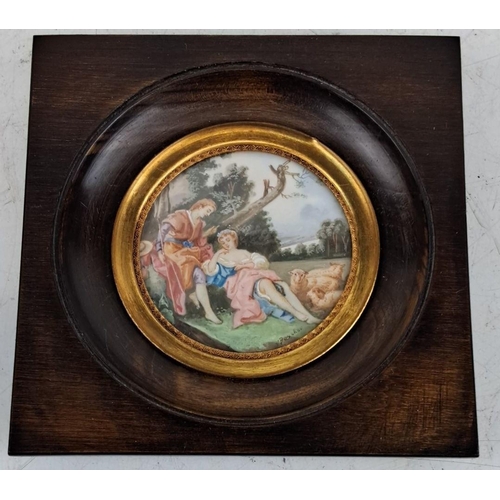 131 - Antique Hand-painted porcelain plaque depicting a pastoral scene. Set in a wooden frame with a gilt ... 