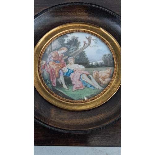 131 - Antique Hand-painted porcelain plaque depicting a pastoral scene. Set in a wooden frame with a gilt ... 