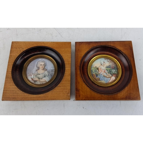 135 - Set of two antique hand-painted miniature portraits on porcelain in circular brass frames, mounted o... 