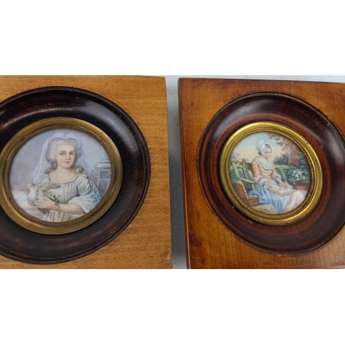 135 - Set of two antique hand-painted miniature portraits on porcelain in circular brass frames, mounted o... 