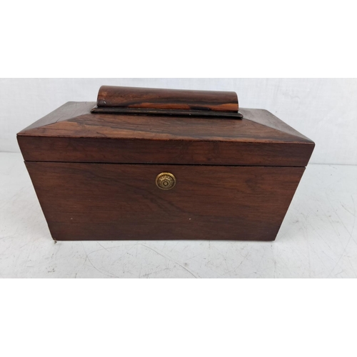 162 - Victorian mahogany tea caddy featuring a brass escutcheon, dual compartments with original lids, and... 