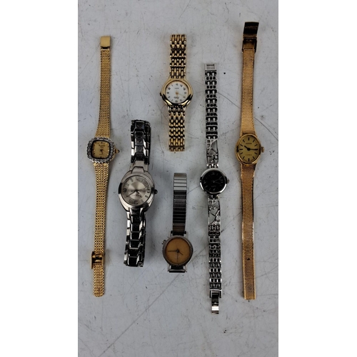 164 - Collection of six assorted wristwatches. Includes both gold-tone and silver-tone designs. Features b... 