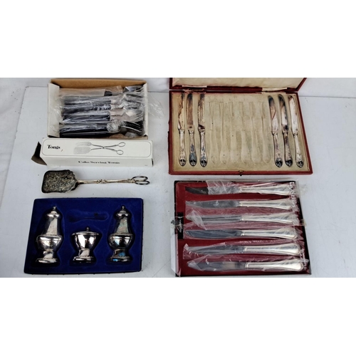 183 - Mixed cutlery and serving items set, including boxed cake serving tongs, silver plated salt and pepp... 