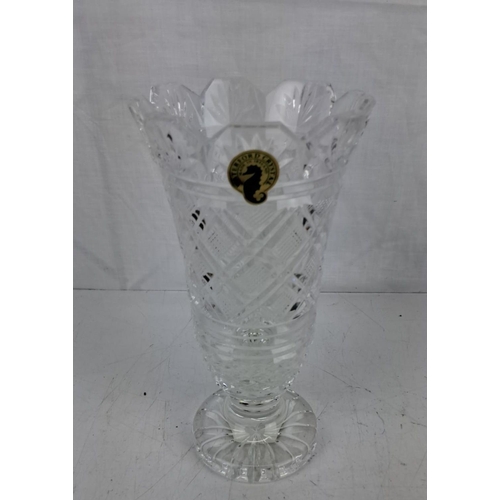 26 - Waterford Crystal vase in original box. Features intricate cut patterns and scalloped rim.