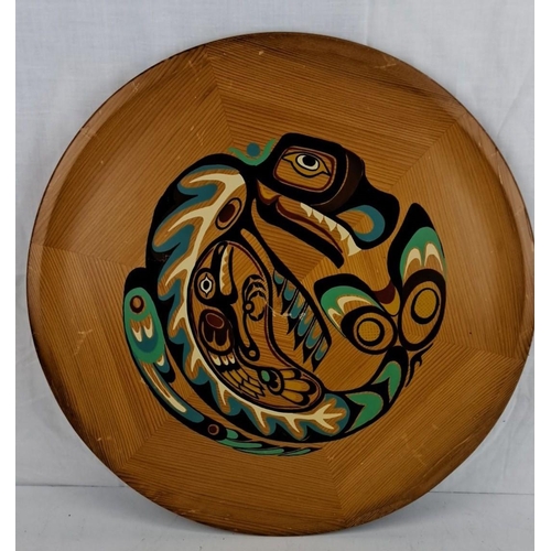 34 - Handcrafted wood tray featuring an indigenous-style painting of a serpent, accented with vibrant gre... 