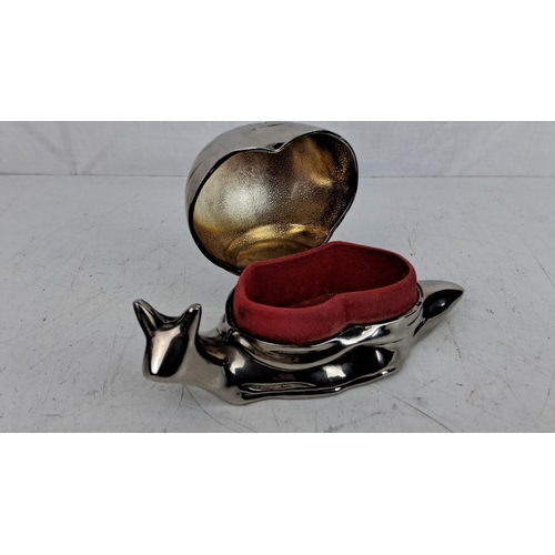 48 - Vintage Silver-plated snail-shaped trinket box with a hinged shell lid. Interior lined with red fabr... 