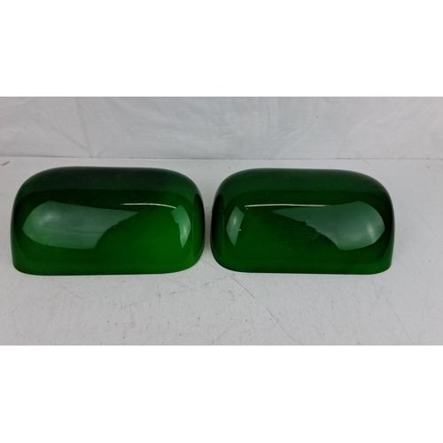 52 - Pair of green glass bankers lamp shades. Likely mid-century modern style. Smooth, glossy finish with... 