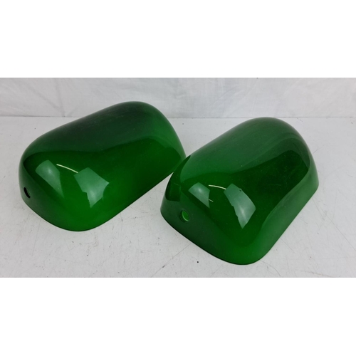 52 - Pair of green glass bankers lamp shades. Likely mid-century modern style. Smooth, glossy finish with... 