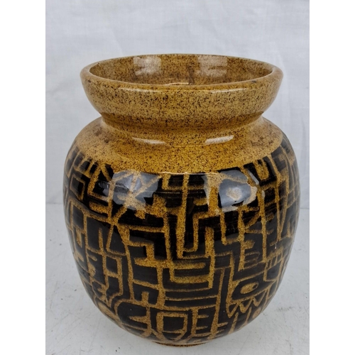 54 - Vintage ceramic vase with a yellow ochre and black geometric pattern, featuring a wide mouth and hig... 