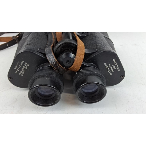 63 - Asahi Pentax 10x50 field 5.5° prism binoculars with coated optics. Includes original leather carryin... 