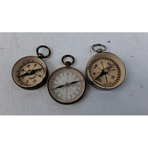 78 - Set of two Vintage German Pocket Compasses. Brass and chrome construction with loop handles. Each co... 