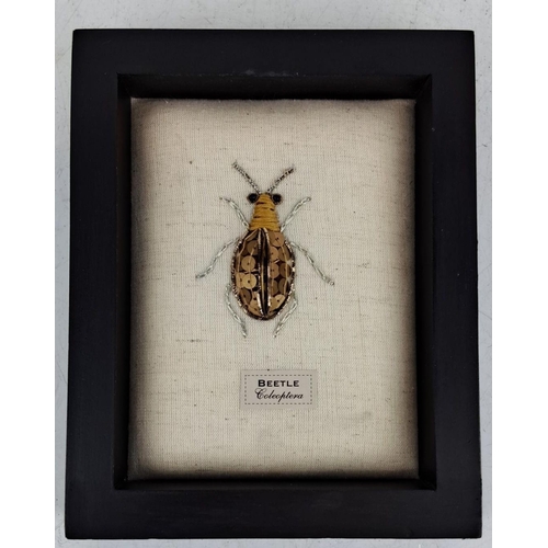 94 - Framed artwork depicting a beetle from the order Coleoptera. Meticulously crafted with metallic thre... 