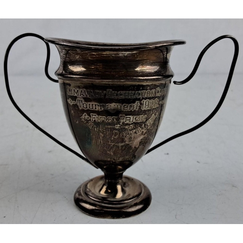 194 - Sterling Silver trophy with handles. Inscribed 