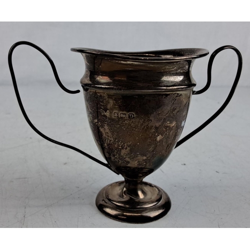 194 - Sterling Silver trophy with handles. Inscribed 