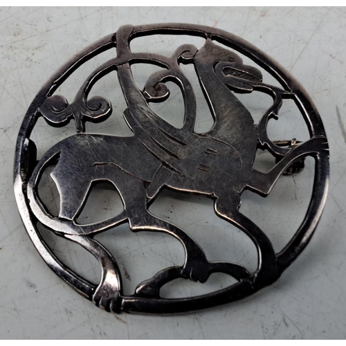 195 - Sterling Silver brooch depicting a griffin, inspired by a harness ornament found in Quendale, Shetla... 