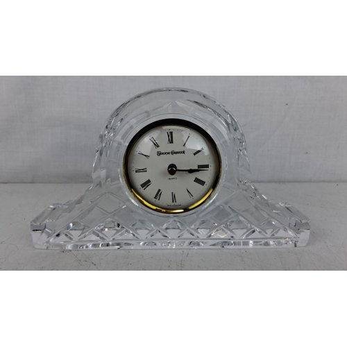 200 - Tyrone Crystal mantel clock with quartz movement. The clock features a classic Roman numeral face an... 