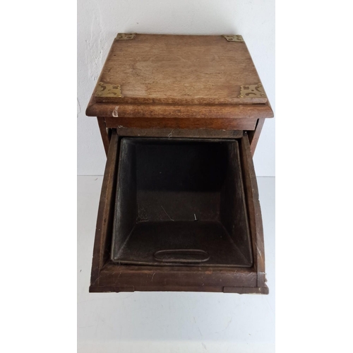 211 - Antique oak coal scuttle with ornate brass hardware from the Victorian era. It features a hinged lid... 