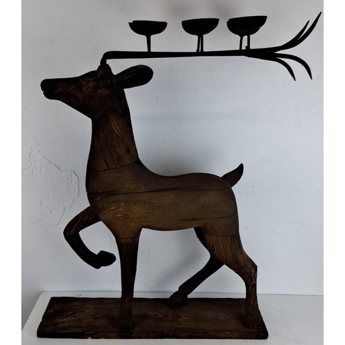 214 - Hand-carved wooden reindeer candle holder centrepiece with metal antlers featuring six candle cups. ... 