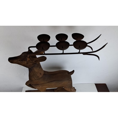 214 - Hand-carved wooden reindeer candle holder centrepiece with metal antlers featuring six candle cups. ... 