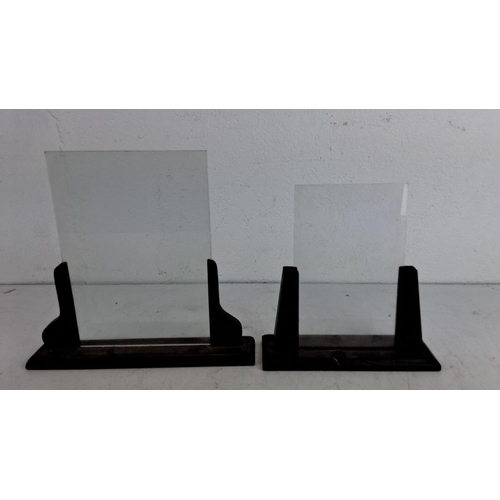 225 - Pair of vintage glass picture frames with dark wooden bases. Clear glass panels of differing heights... 