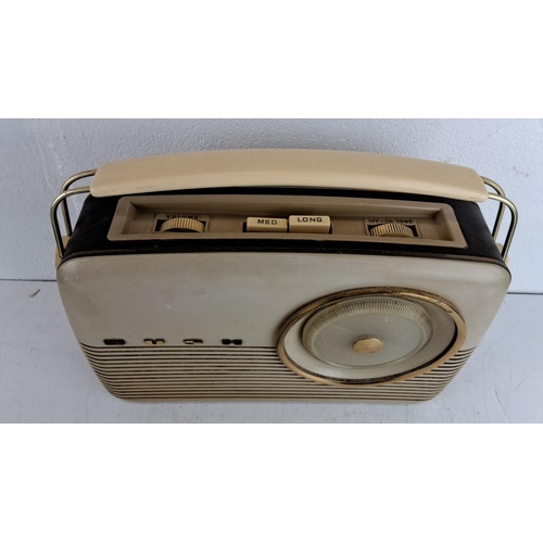 235 - Vintage Bush Portable Radio. This item features a classic cream and gold design and includes medium ... 