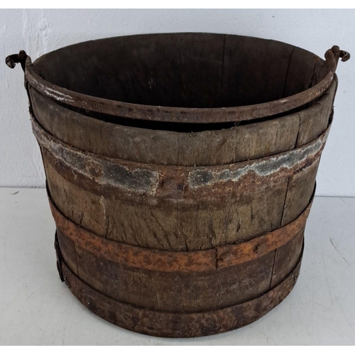 428 - Antique wooden well bucket with metal bands and handles, likely 19th century. Showcases rustic craft... 