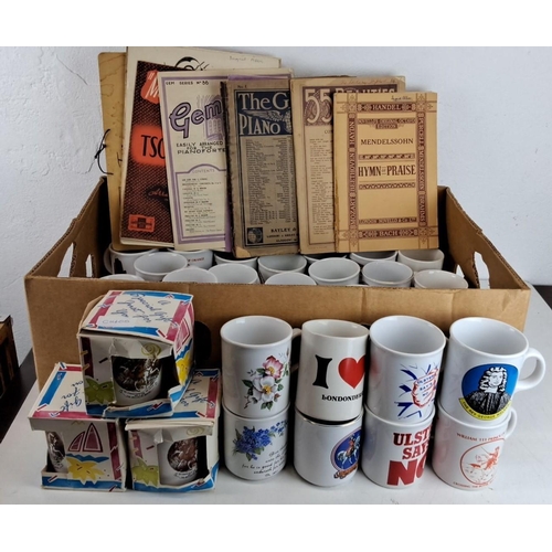 438 - Mixed lot including over 20 ceramic mugs with various prints and slogans, and a collection of vintag... 