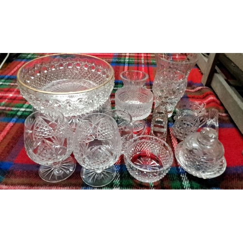 455 - Collection of fourteen cut glass and crystal pieces featuring various bowls, glasses, and a pitcher.... 