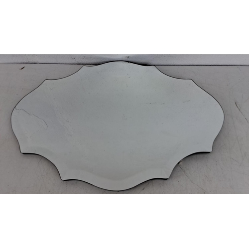 458 - Vintage shaped wall mirror with a scalloped edge design, measuring approximately 20x14 inches. It ha... 