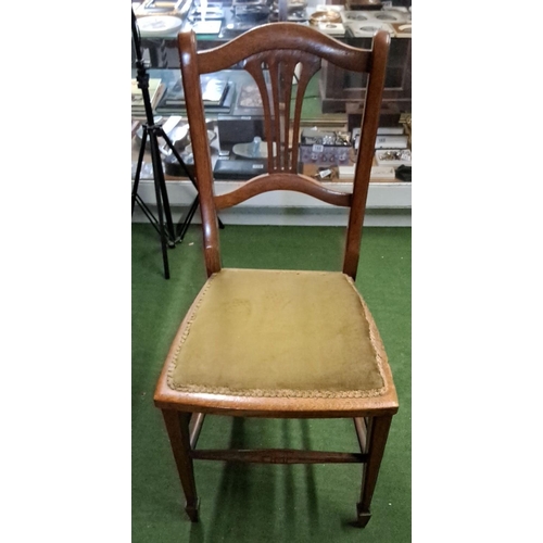 464 - Early 20th-century oak dining chair with an elegant curved backrest and green upholstered seat.