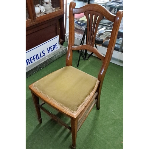 464 - Early 20th-century oak dining chair with an elegant curved backrest and green upholstered seat.