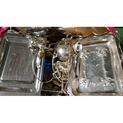 475 - Mixed lot of silver-plated serving trays and utensils, featuring ornate designs and varied sizes. In... 