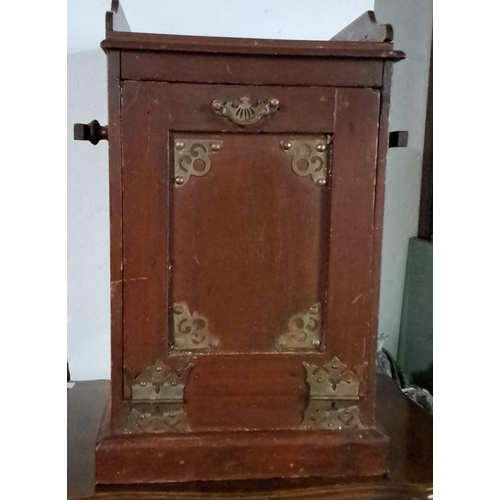 492 - Antique mahogany cabinet with brass hardware embellishments. From the late 19th to early 20th centur... 