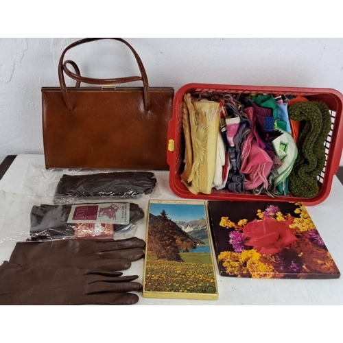 494 - Mixed lot featuring a brown leather handbag, basket with assorted scarves, two pairs of brown leathe... 