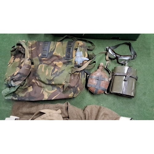 209 - Motorcycle helmet, goggles, flasks, camouflage bag and overalls.