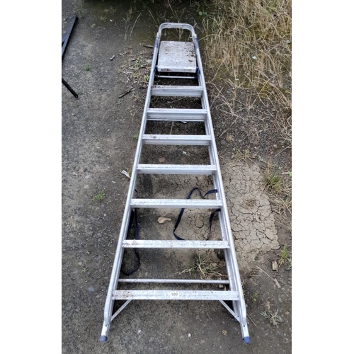 500 - Aluminum ladder with support platform. Features multiple steps for various height adjustments. Rugge... 