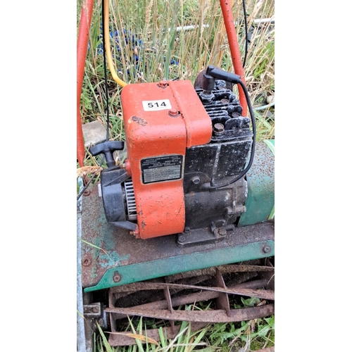 514 - Vintage Suffolk lawnmower, with original orange and green color scheme. Made by Suffolk Lawn Mowers ... 