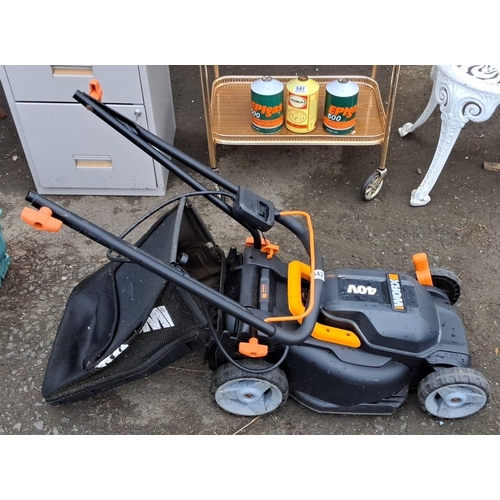 542 - WORX 40V cordless lawn mower with adjustable handle and grass catcher. Compact design. (battery not ... 