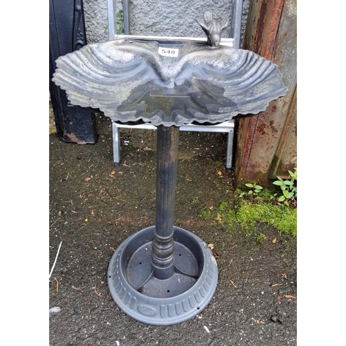 548 - Bird bath featuring a sculpted bird and scalloped edges.