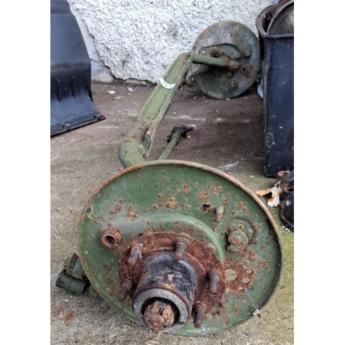 561 - Vintage green-painted axle with differential and brake assemblies. Estimated mid-20th century.