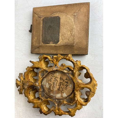 122 - Two antique miniature portrait paintings in ornate frames. One frame is green with gold accents, the... 