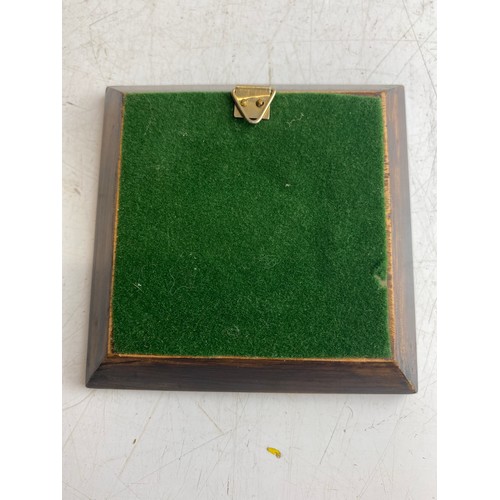 130 - Framed miniature enamel portrait of a woman in a red cloak. Painted on porcelain, with a wooden and ... 