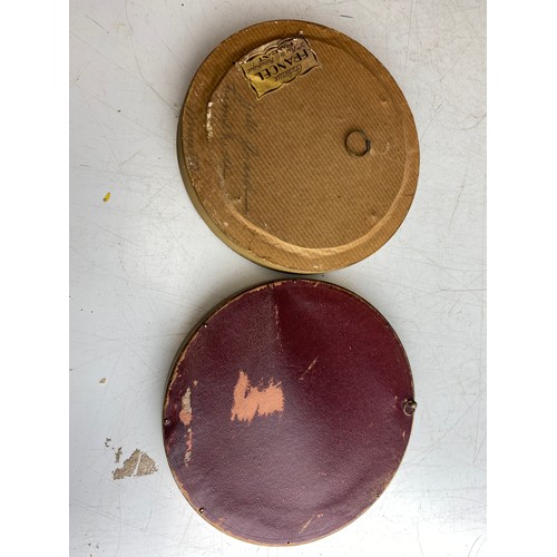 136 - Pair of late 19th-century round framed prints, featuring romantic and domestic scenes. The prints ar... 