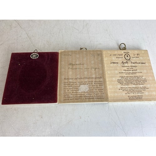 127 - A pair of antique German hand painted miniatures in a decorative bone and tortoise shell frame and a... 