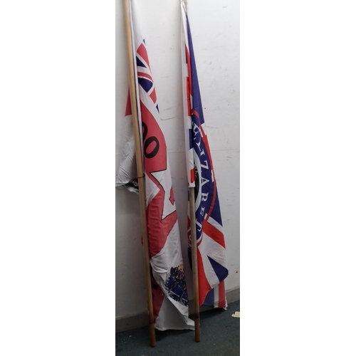 14 - Two commemorative flags: one marking Queen Elizabeth II’s Platinum Jubilee (1952-2022) and one notin... 